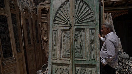 In pics: Business of recovering antique doors in Egypt - EgyptToday